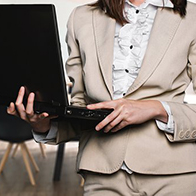 woman holding a laptop
