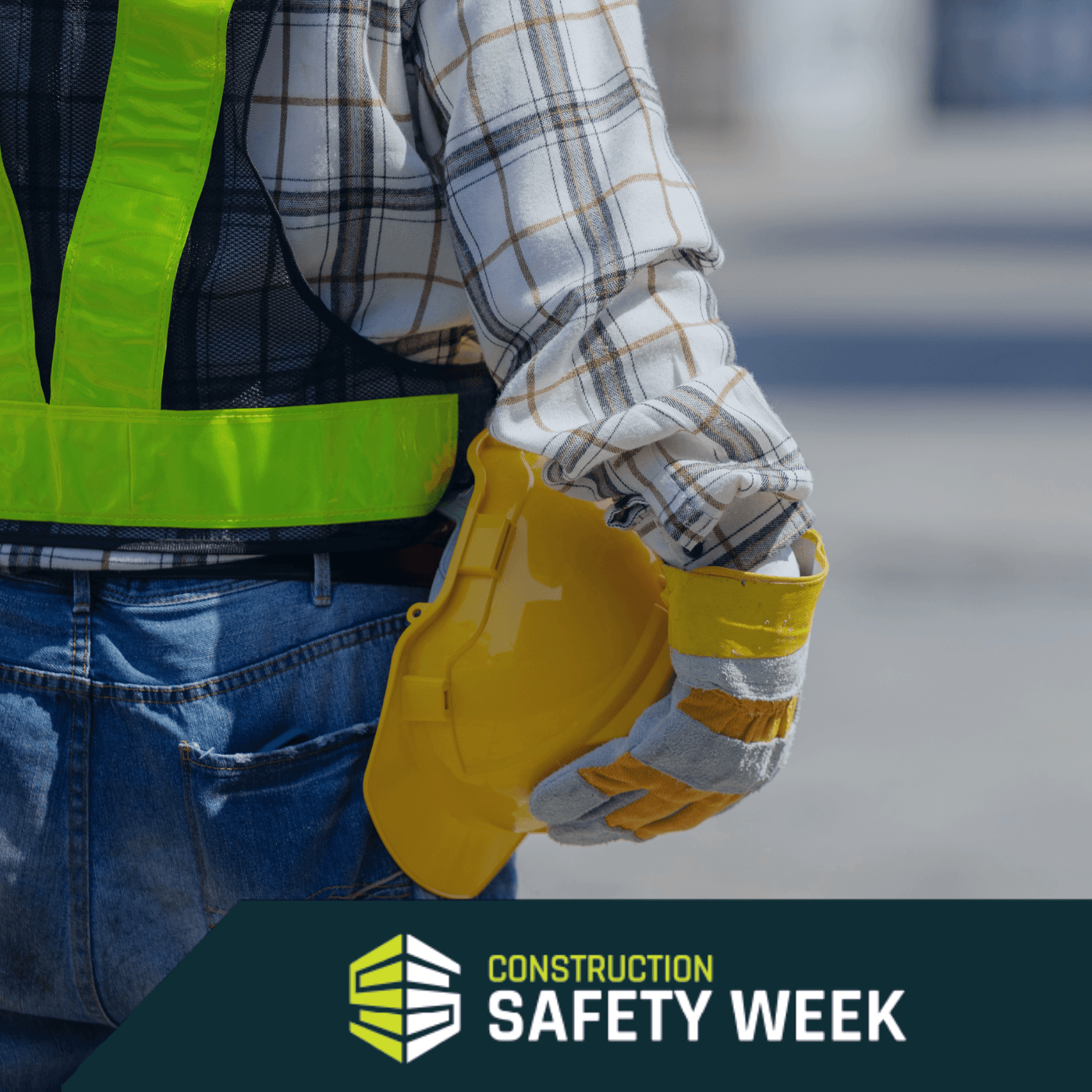 Construction Worker Holding Hard Hat
